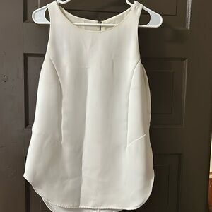 White sleeveless blouse by CAbi size small